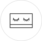 Icône minimaliste représentant un visage fermé avec les yeux clos symbolisant la détente et le bien-être